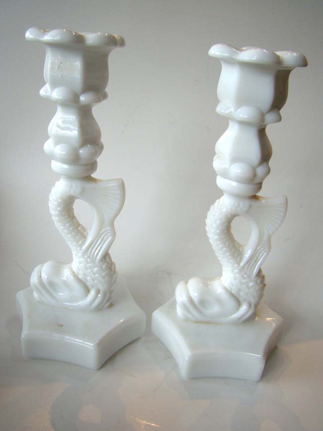 An attractive pair of vintage Milk Glass Dolphin form candle holders made circa 1930